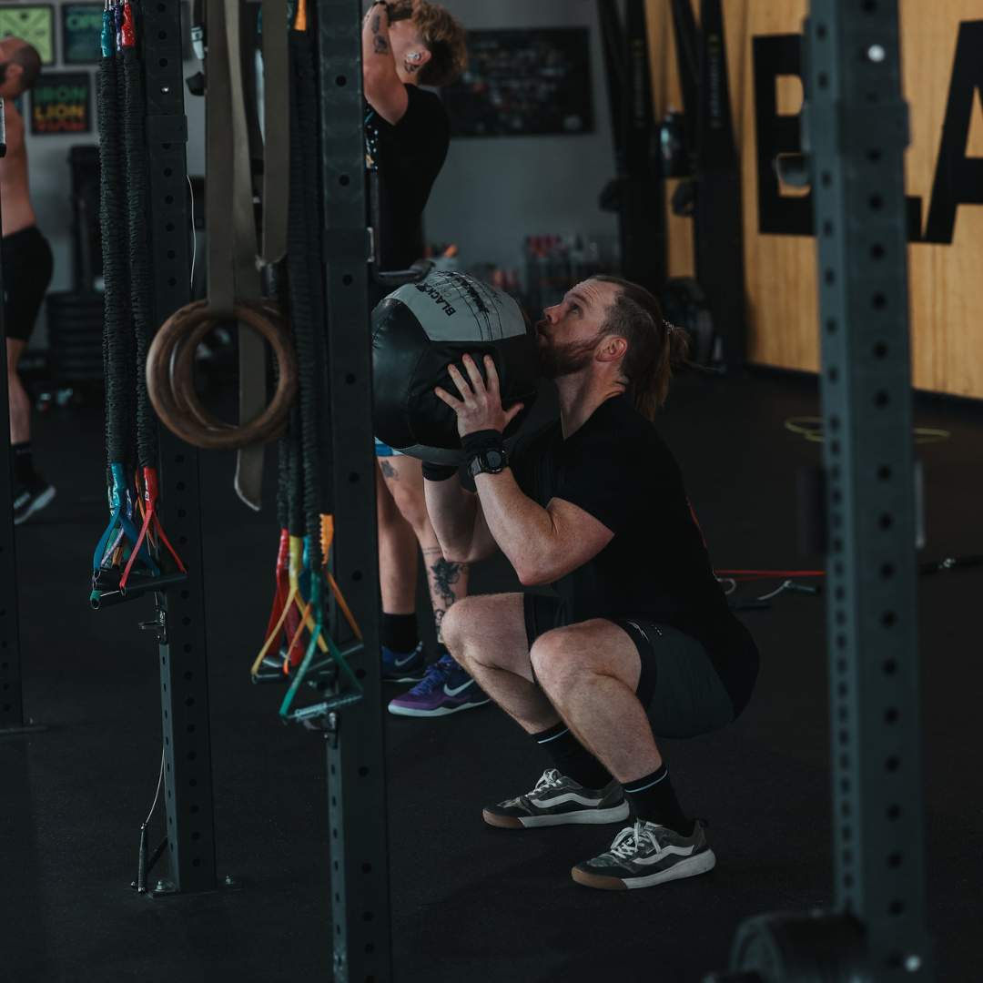 Member doing wall balls
