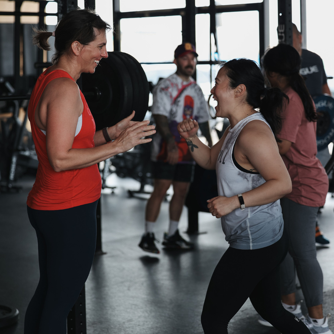 Members encouraging each other during a workout