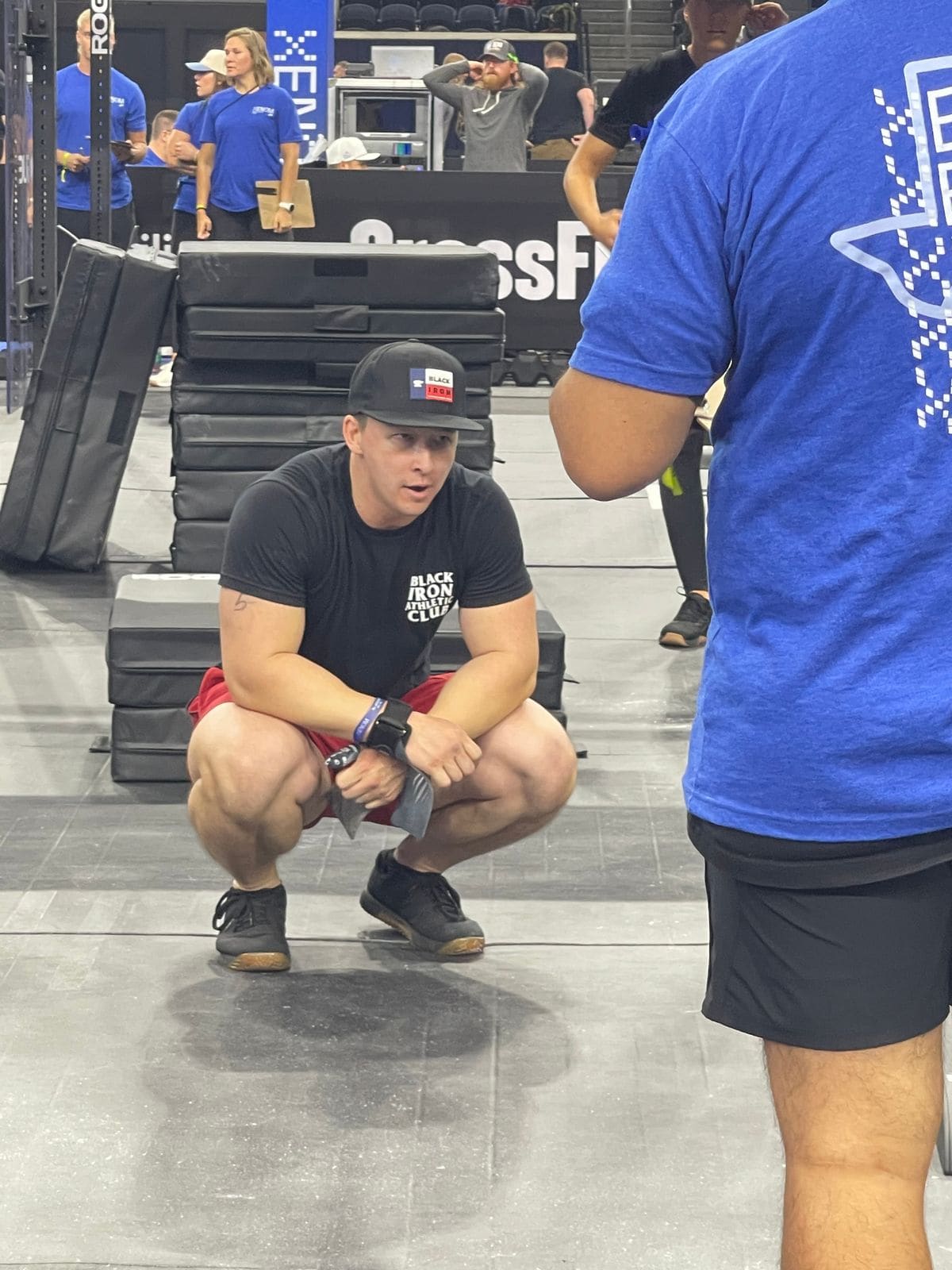 Coach Lawrence Ford of Black Iron Athletics on the competition floor at XENOM Frisco